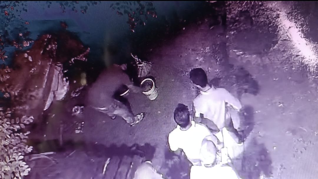 Excitement around bomb recovery from CPIM candidate's house. Kanti Ganguly next to the terrified family.